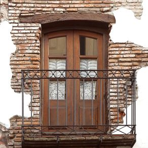quadro-janela-de-um-muro-de-tijolinhos